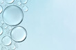 canvas print picture - serum or cosmetic liquid water bubbles floats drops surface background