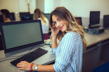 Poster - College students in a computer lab