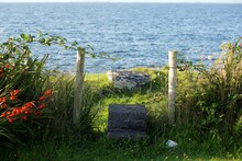 A Stile For Crossing A Ditch Between A Garden And The Sea Shore In County Galway On The West Coast Of Ireland 