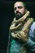 © Alex Sobrino - portrait of a man with a scarf made of rope