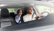 © Syda Productions - transportation, vehicle and people concept - smiling middle aged male passenger calling on smartphone on back seat and car driver