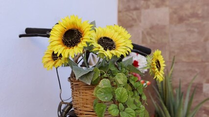 Canvas Print - A basket with sunflowers on the bicycle shot in 4K