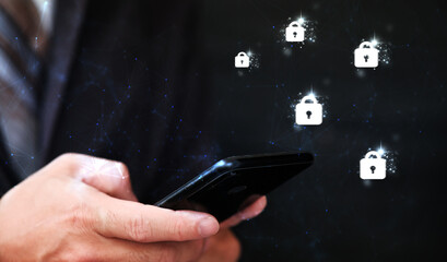 Poster - Businessman with protective gesture Lock icon to protect the security, copy space, Cyber security, Data protection