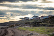 © Cavan Images - Unique homes built on bluff overlooking the ocean in Iqaluit, Canada.