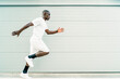 © Cavan Images - young african man training his running technique
