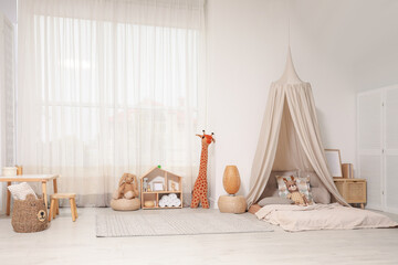 Wall Mural - Cozy kids room with play tent, toys and comfortable floor bed. Montessori interior