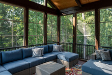 New Modern Screened Porch With Patio Furniture, Summertime Woods In The Background.