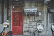 © Yuna Zembo - Old house with a red door and the complicated pipe - Taiwan