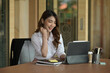 © saltdium - Attractive Asian girl celebrate with tablet, success victory pose, startup small business concept, modern office with copy space.