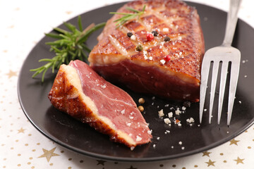 Sticker - grilled duck breast with sauce and rosemary