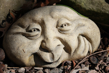 Sticker - Closeup shot of a face-shaped stone