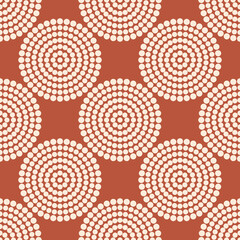  Seamless modern pattern with creative spheres made up of small circles. Print for fashion fabrics, decorative pillows, wrapping paper. Brown and pastel pink.