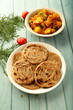 Indian food cuisine- healthy organic whole wheat paratha, porota  sertved with aloo paneer . vegetarian meal background.