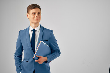 cheerful manager in a suit documents work Office professional