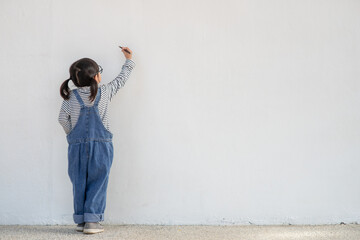 Wall Mural - Little children painting on white wall