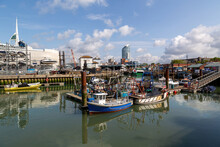 The Camber Dock In Old Portsmouth On A Calm Summers Day With Fishing Bots Docked