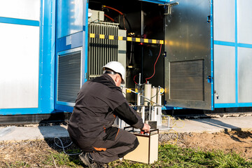 Wall Mural - execution of electrical measuring works on the power transformer