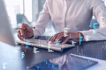 Wall Mural - Woman typing the keyboard to research stock market to proceed right investment solutions. Internet trading and wealth management concept. Formal wear. Hologram Forex chart over close up shot.