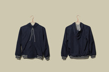 Blank Blue Sport Jacket Mockup Set Hanging On Hanger, Front And Back Side View On Wall Background