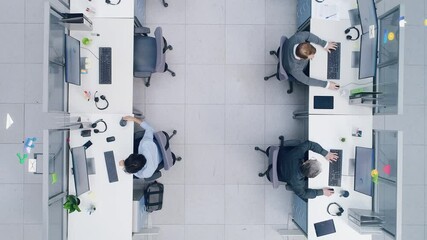 Poster - Top Down Footage of a Busy Corporate Office with Tow Rows off Businessmen and Businesswomen Working on Desktop Computers. VFX Animation of Connected Technological Social Network Between Colleagues.