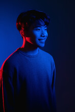 Smiling Asian Man Color Light Portrait Neon Blue