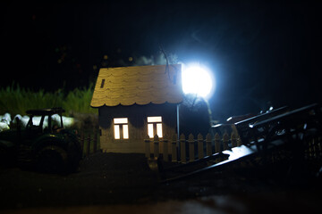Wall Mural - full moon over quiet village at night. beautiful night landscape of mountain village under the moonl