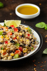 Wall Mural - Quinoa black bean salad with corn, red green pepper, onion. Healthy food.