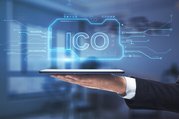 Aufkleber - Close up of hand holding tablet with creative ICO chip hologram on blurry office interior background. Initial coin offering concept. Double exposure.