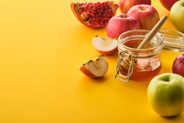 Jewish holiday Rosh Hashana design with honey and apples