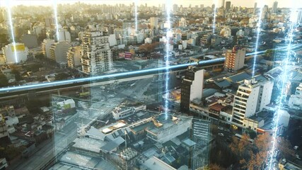 Aerial shot over digital modern city with high tech data communication in sunset - Flight over Buenos Aires with driving speed train with connection lines