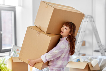 Sticker - moving, people and real estate concept - asian woman holding big heavy boxes with stuff at new home