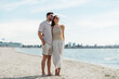 © Syda Productions - summer holidays and people concept - happy couple on beach in tallinn, estonia