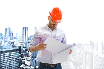 Double exposure image of construction engineer manager workers in orange hardhat and looking layout plan standing during overlay with construction site in the city.