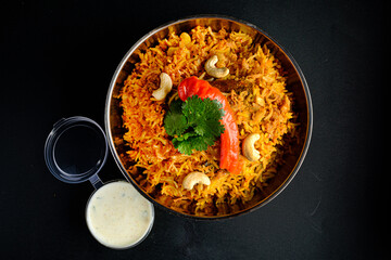 Sticker - top view of biryani or biriyani with various vegetables and fruits on pulau