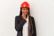 © Asier - Young african american architect woman isolated on white background biting fingernails, nervous and very anxious.