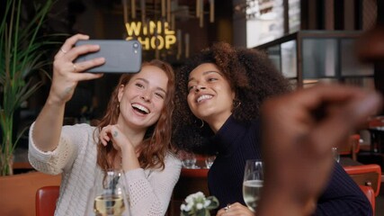 Wall Mural - Slow motion of friends taking selfie in bar