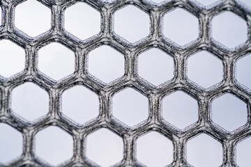 Wall Mural - Hexagonal abstract background backdrop. Printed on a 3D printer with transparent plastic.