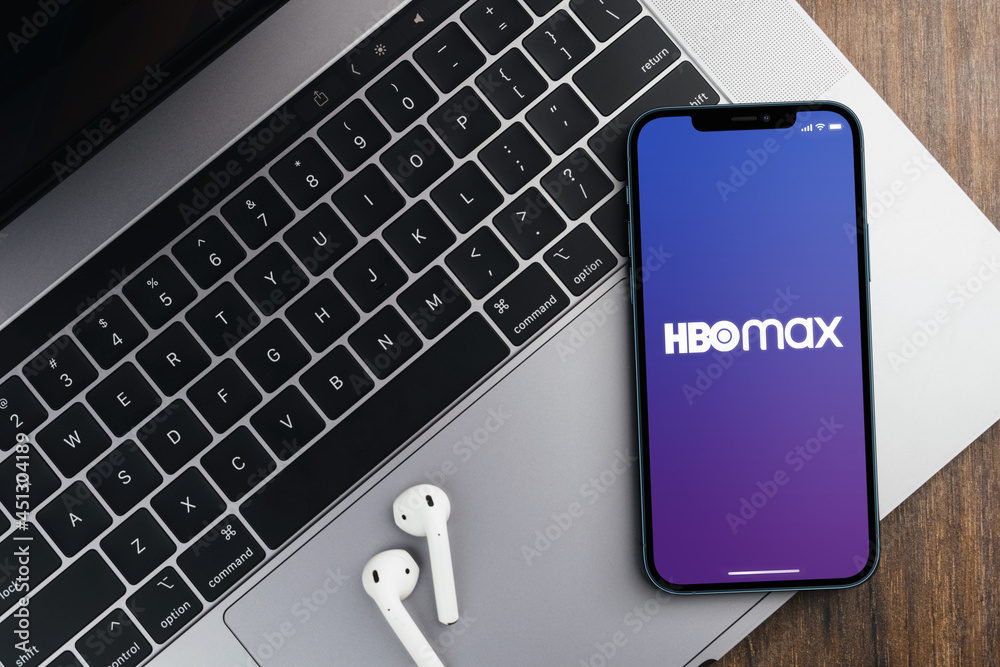 Hbo Max app on the smartphone screen on wooden background with a ...