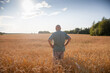 © DariaTrofimova - Mature man in   wheat field at sunset