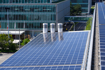 Roof of terminal building at Geneva Airport with solar panels. Photo taken July 29th, 2021, Geneva, Switzerland.