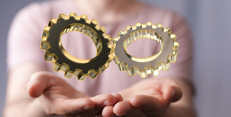 Poster - Cyborg hand holding a gear wheel interface 3d rendering.