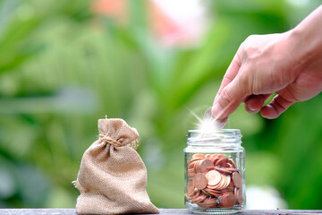 Poster - Coins on table background and saving money and business growth concept,finance and investment concept