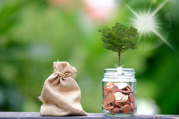 Poster - Close up Coins on table, Saving money for finance accounting, Investment And saving Concept, banking and account for money in finance accounting concept.