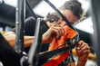 © ADDICTIVE STOCK - Male mechanic wiping bicycle frame in garage
