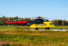 Yellow Rescue Medical Helicopter At The Site Outside The City