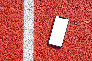 Phone mockup on running track close-up