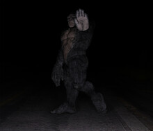 3d Illustration Of A Bigfoot Crossing A Road And Being Illuminated By Car Headlights