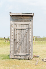 Wall Mural - old weathered outhouse