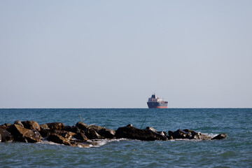 Poster - Russia. Tuapse 08.08.2021 cargo ship sails on the sea