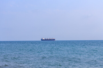 Poster - Russia. Tuapse 08.08.2021 cargo ship sails on the sea